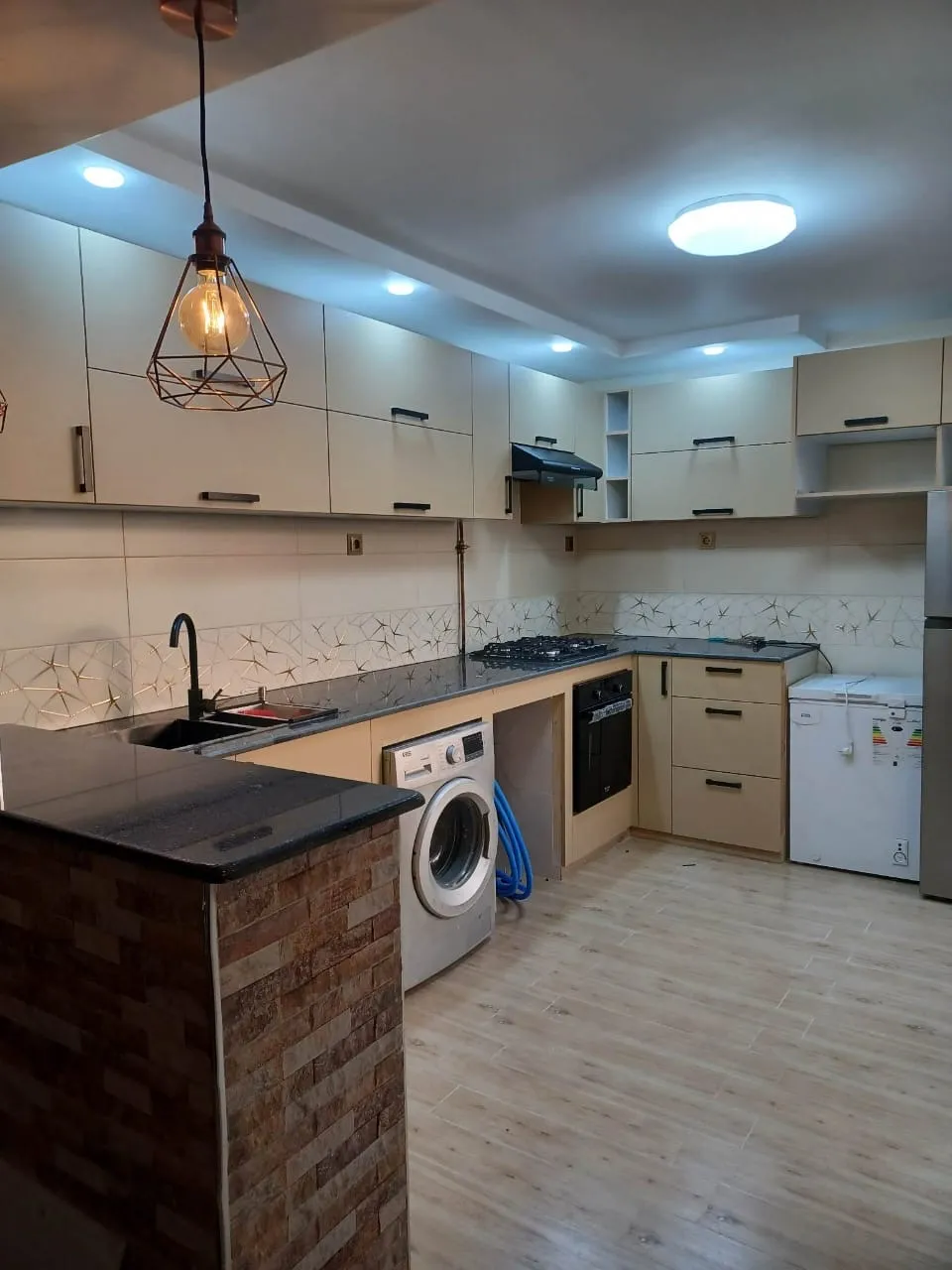 Installation de plomberie dans une cuisine